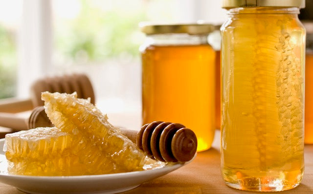 Raw Jars Of Honey, Teas & Herbs